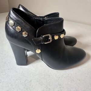 Isola Black Leather Ankle Booties with Gold Hex Studs